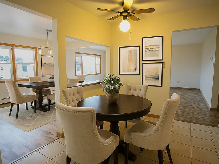 Virtually Staged Eat-In-Kitchen and view of dining and living rooms
