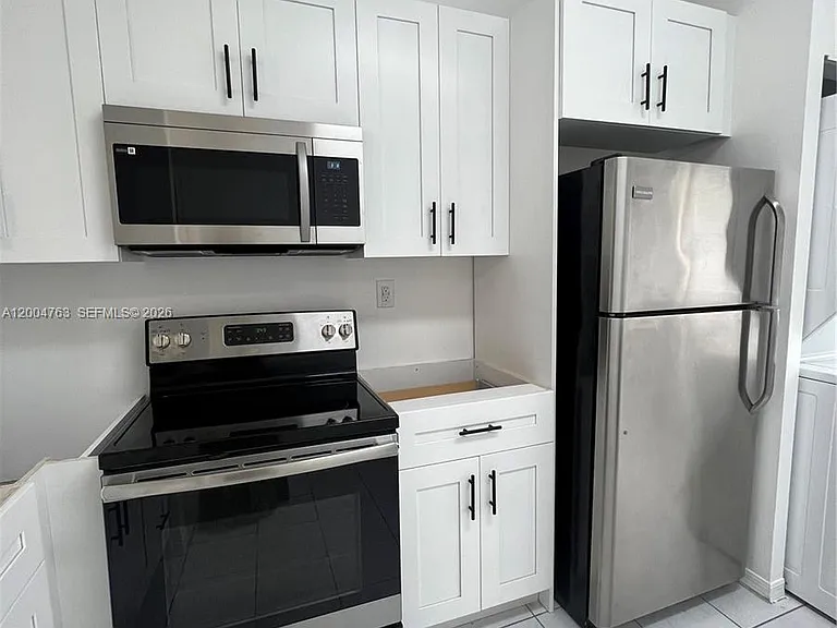 6960 NW 174th Ter #706 — Photo 13