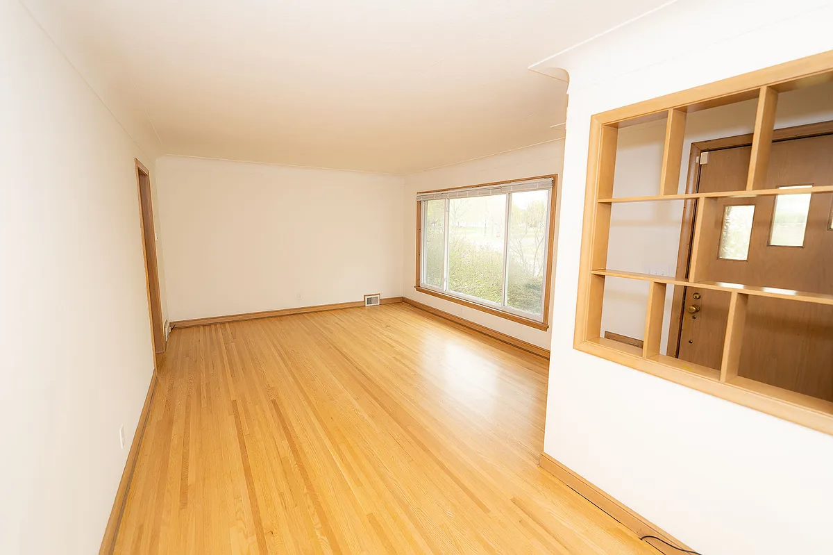 Stunning refinished hardwood floors throughout the main level. - 531 Russell Ave N