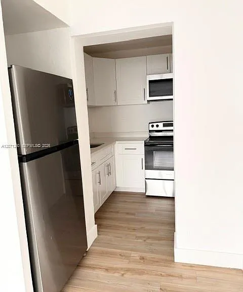 401 SE 10th St #REAR — Photo 6