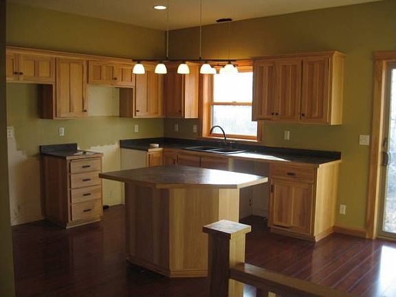 Kitchen has mapel cabinet