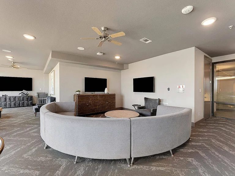 Enjoy movies, sports, and community events in our stylish media lounge.