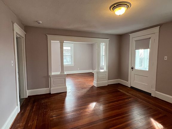 Original hardwood floors and lots of room and natural light in this space. Use it as a second bedroom, living room, dining room, office, or whatever you need!