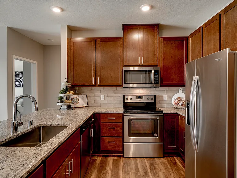 Our open kitchens offer ample counter space and modern finishes, perfect for preparing meals or hosting gatherings.