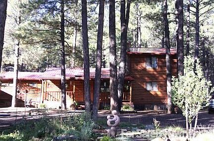 Front of Home Amid Ponderosa Pines