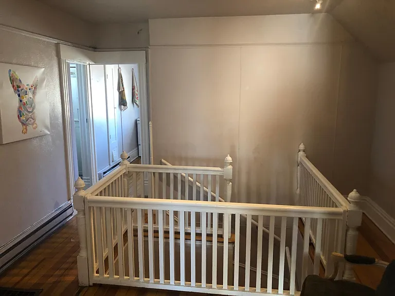 Top of the stairs.