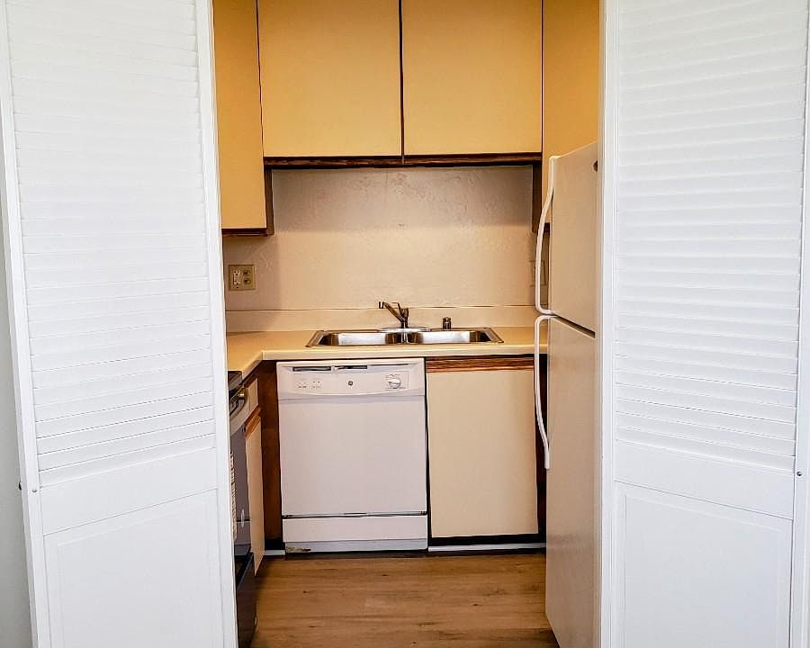 Kitchen with stainless New refridgerator. Equiped with Stove, Dishwasher and microwave.