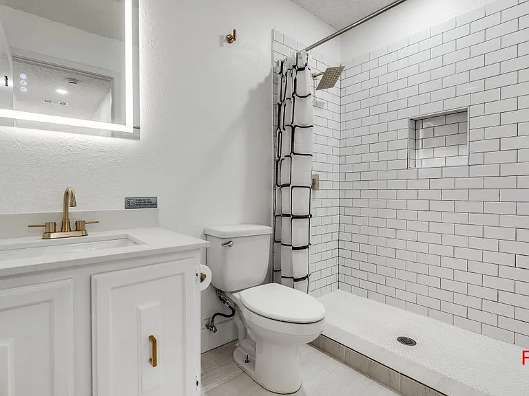 Shared Bathroom F (Upstairs)