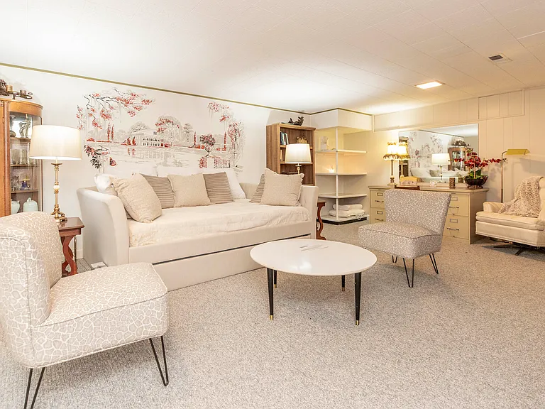 Lower level, queen daybed, twin trundle seating area, dedicated work space, shelves & printer.