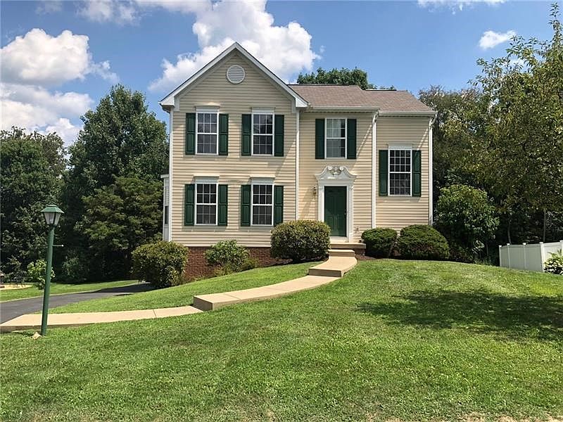 Front. Welcome home! This beautiful home rests on one of the largest lots (1.04 acres) in desirable Beaver Woods.