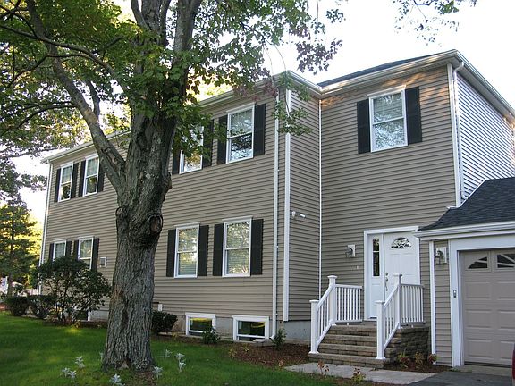Wolcott Rd. Side view/entry & garages
