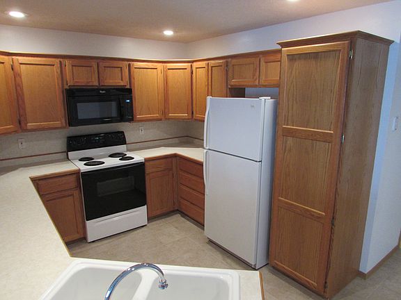Large kitchen with oodles of cabinets!
