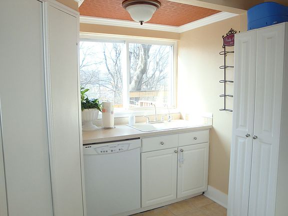 other side of kitchen has pantry, sink area