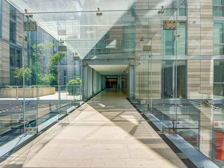 Modern Glass Walkway Connecting Residential Towers