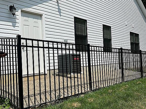Fenced dog run garage entry
