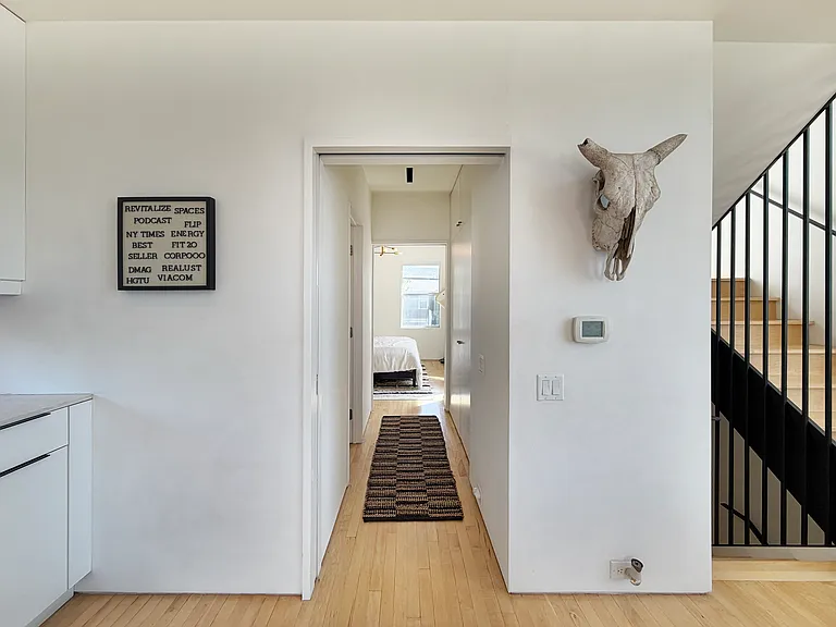 Pocket doors can seclude the guest room + full bath on the second floor.