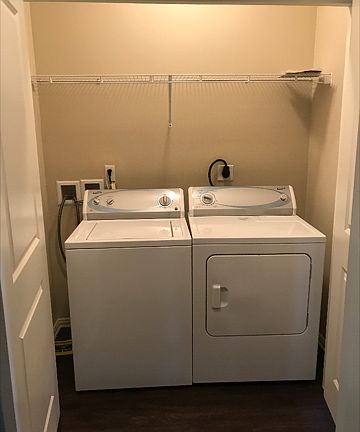 Washer and dryer located in unit