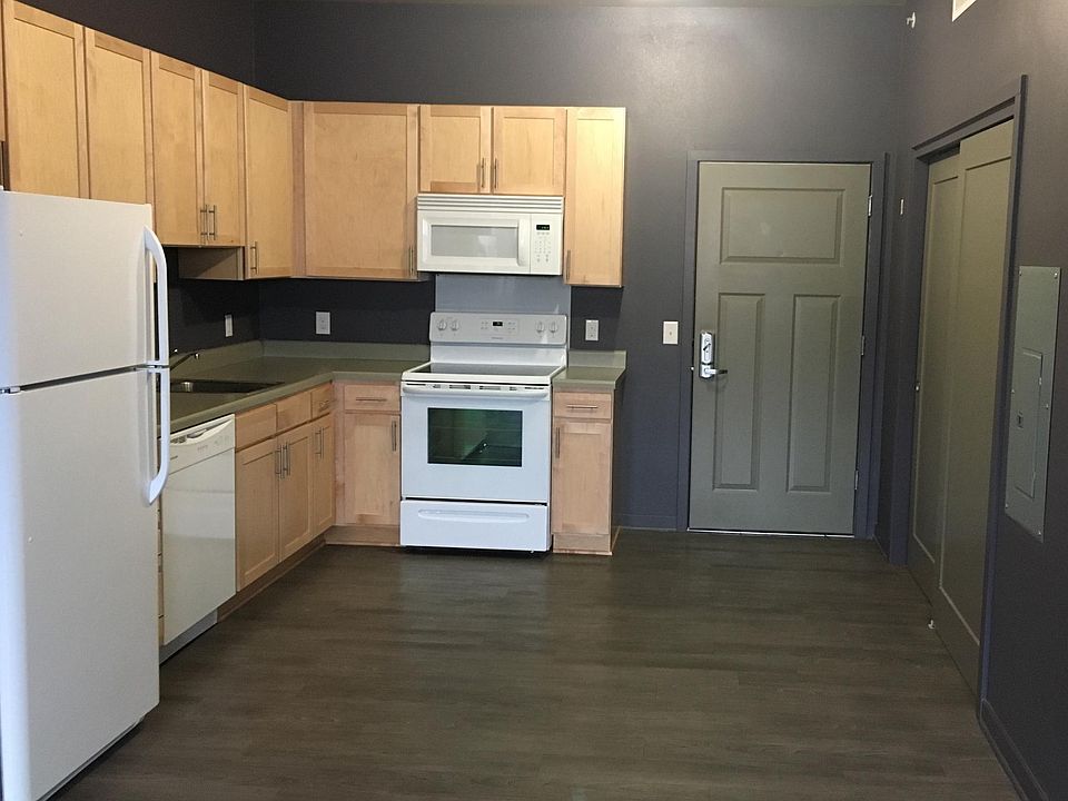 This is the kitchen, entry door & the sliding door is a stor