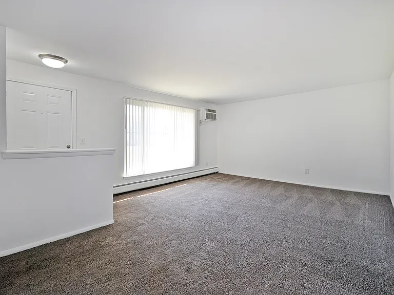 Living Room at Huntington Club Apartments in Warren, MI