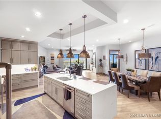 166 Captiva Dr #8E, Sunrise Beach, MO 65079