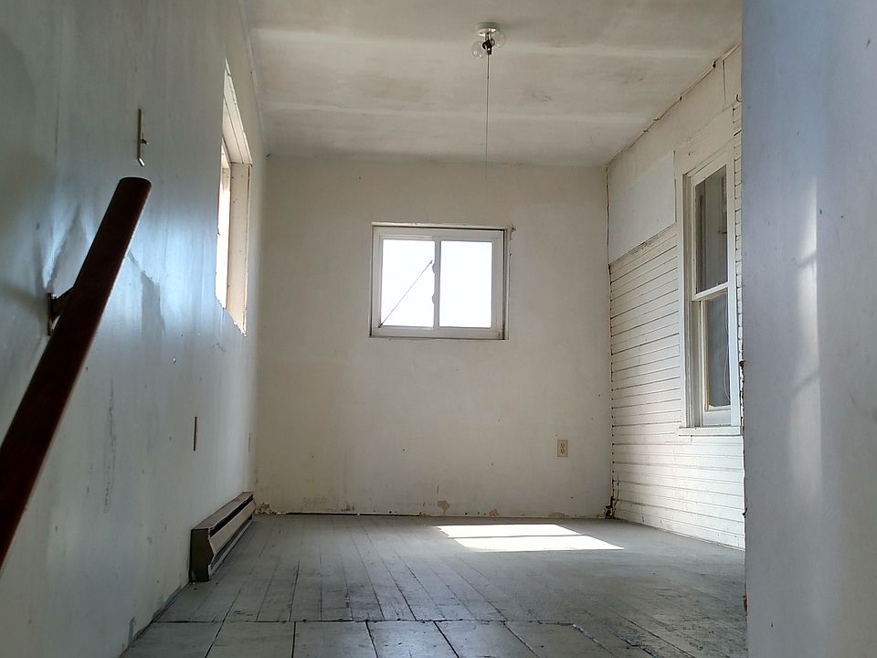 Entrance - stairs lead to mud / entry room.