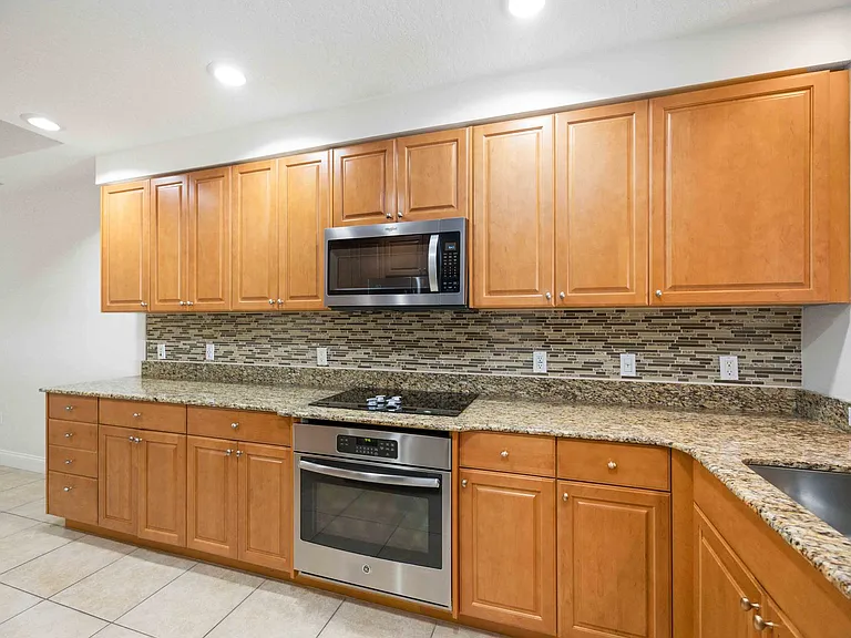 606 Riviera Dunes Way #302 — Photo 3