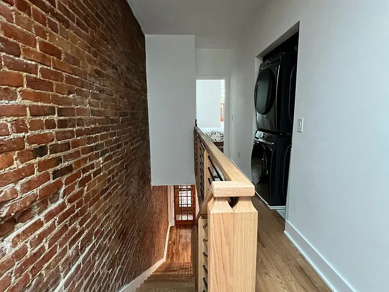 upstairs hallway with skylight