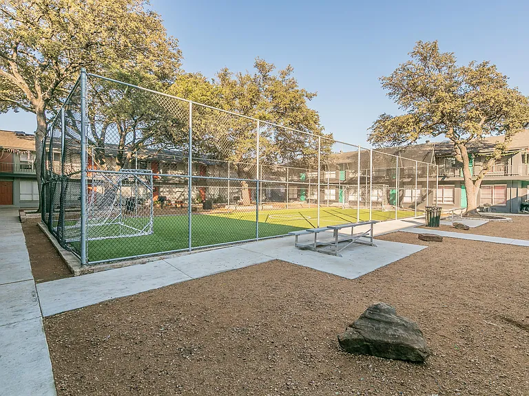 Stay active at the soccer field and green recreation area at Chapel Creek Apartments.
