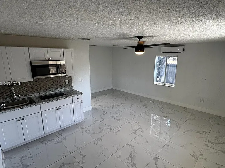 19100 NW 32nd Ave — Photo 1