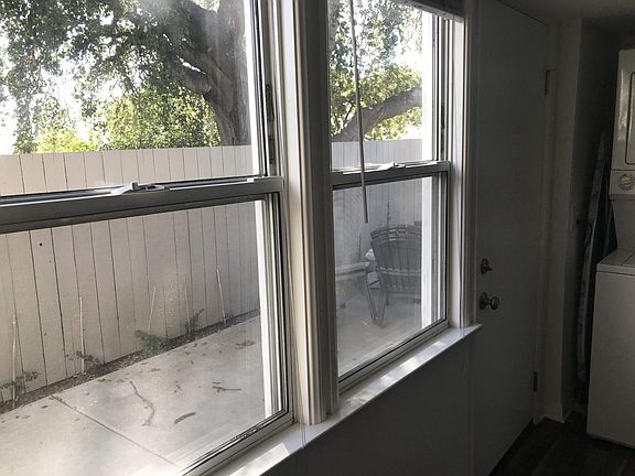 view of back patio from downstairs bonus room.