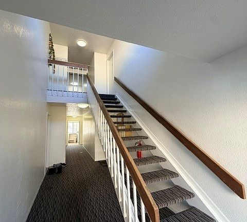 Inside building 2275- up the stairs and to the right is unit H