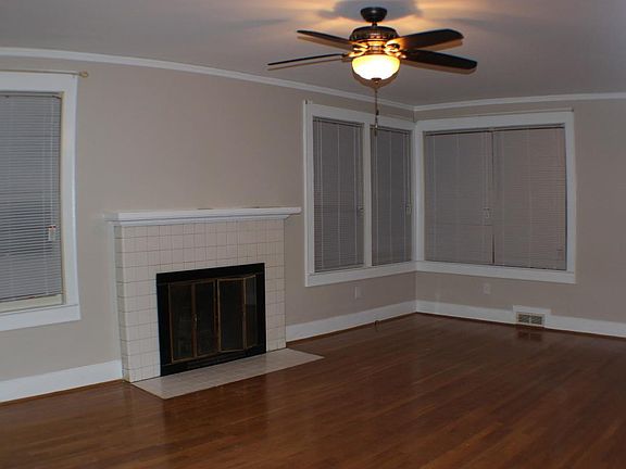 Extra large Great Room with many windows. Fireplace is decorative only.