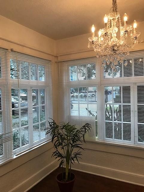 Florida Room with crystal chandier at front entrance