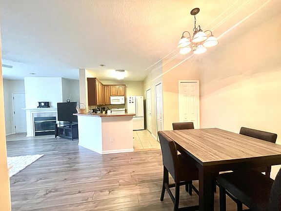 From hall toward dining/kitchen
