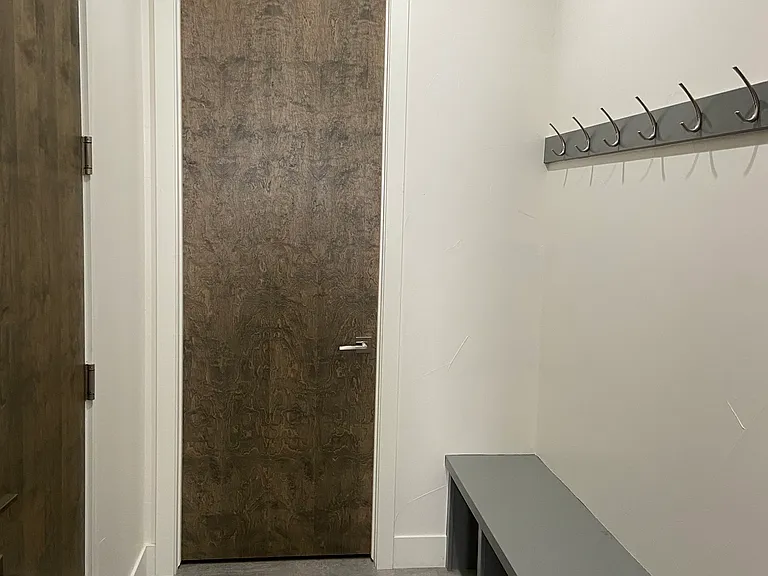 Mud room with coat closet