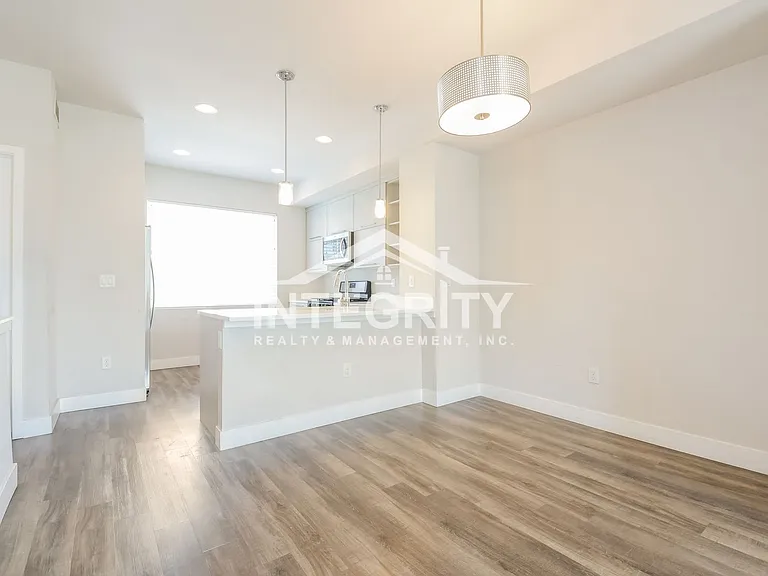5557 W 10th Ave — Photo 8