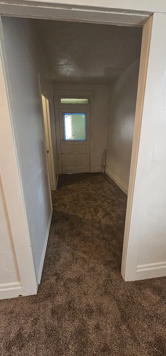 Hallway to bedroom and enclosed porch - 3306 Stafford St