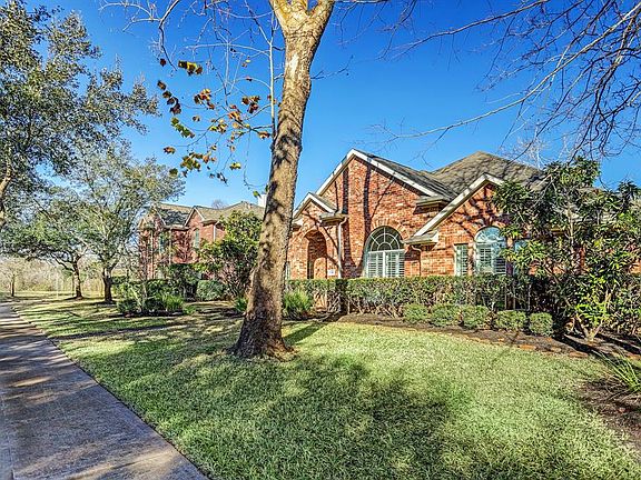 This exceptional property has amazing curb appeal with mature landscaping and large shade trees.