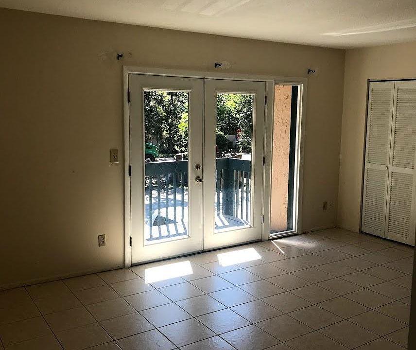Living room with French doors to balcony