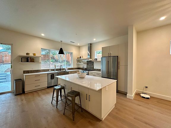 Abundance of cabinet storage, microwave drawer, gas range, refrigerator with ice maker