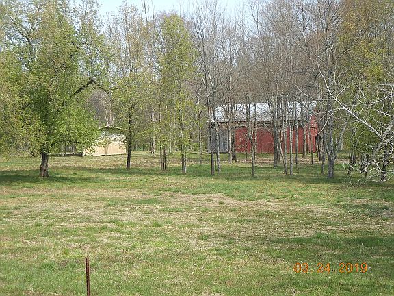 Barn & pole barn on adj. 12 