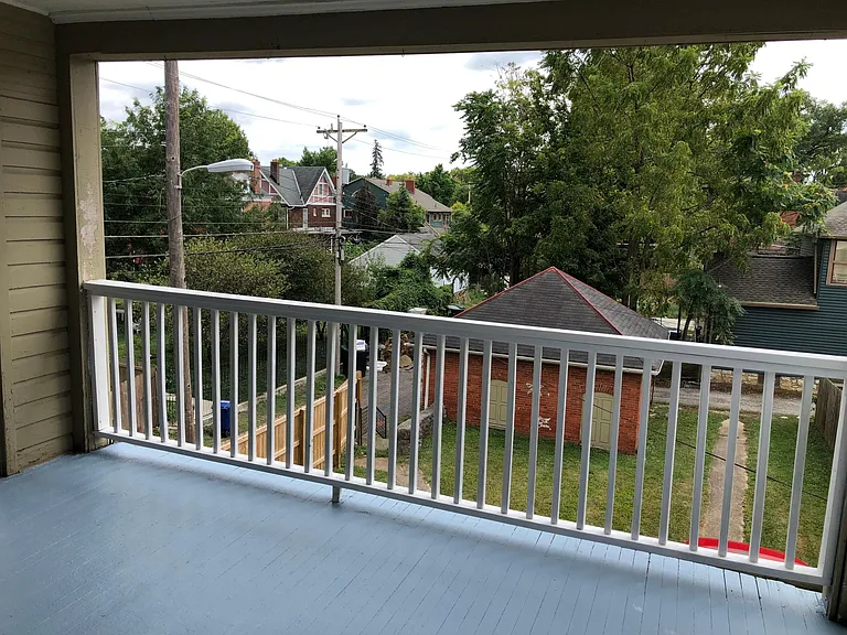 Covered Porch/Balcony with ceiling fan for morning coffee and relaxing