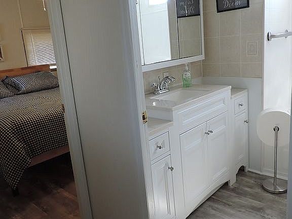 Bathroom into back bedroom
