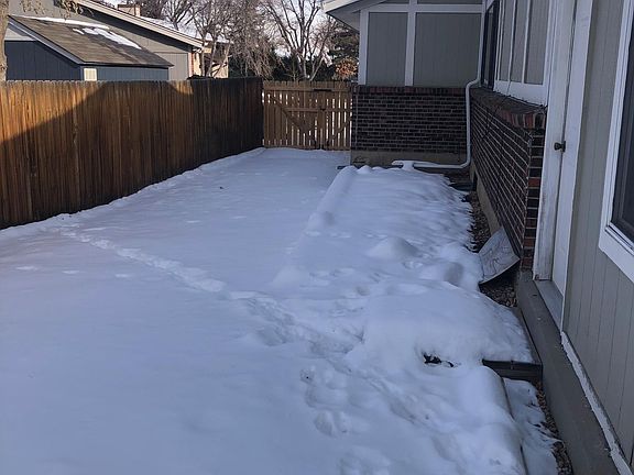 Additional side parking with raised garden area.