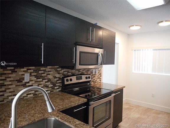 2nd image of 9499 Palm Cir N #9499