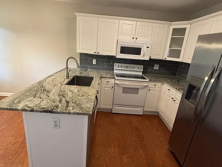 Note that all kitchen appliances have recently been replaced with Stainless Steel models since this photo was taken