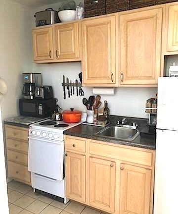 5th image of 400 E 9th St APT 2A