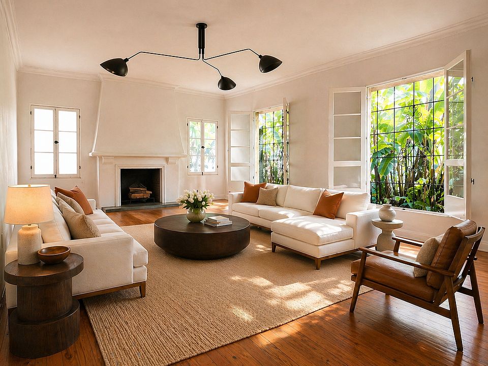 Sunken living room with high ceilings. Morning light