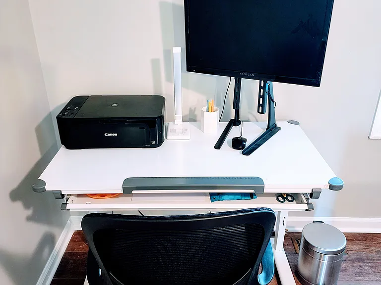 Dedicated workspace with printer, 2nd. screen, basic supplies, and high-speed internet.