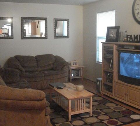 Living Room and Kitchen with Laminate Flooring